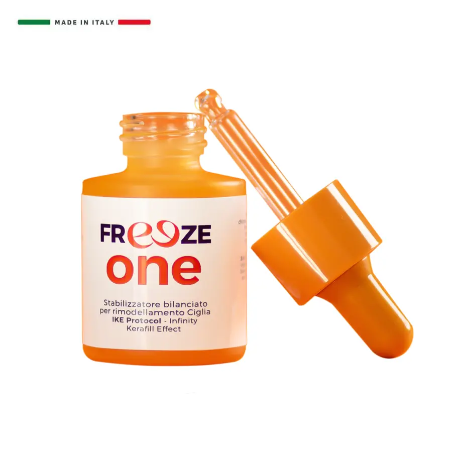Freeze One Laminazione Ciglia Contenitore cosmetico arancione aperto con tappo di lato con pipetta sul tappo